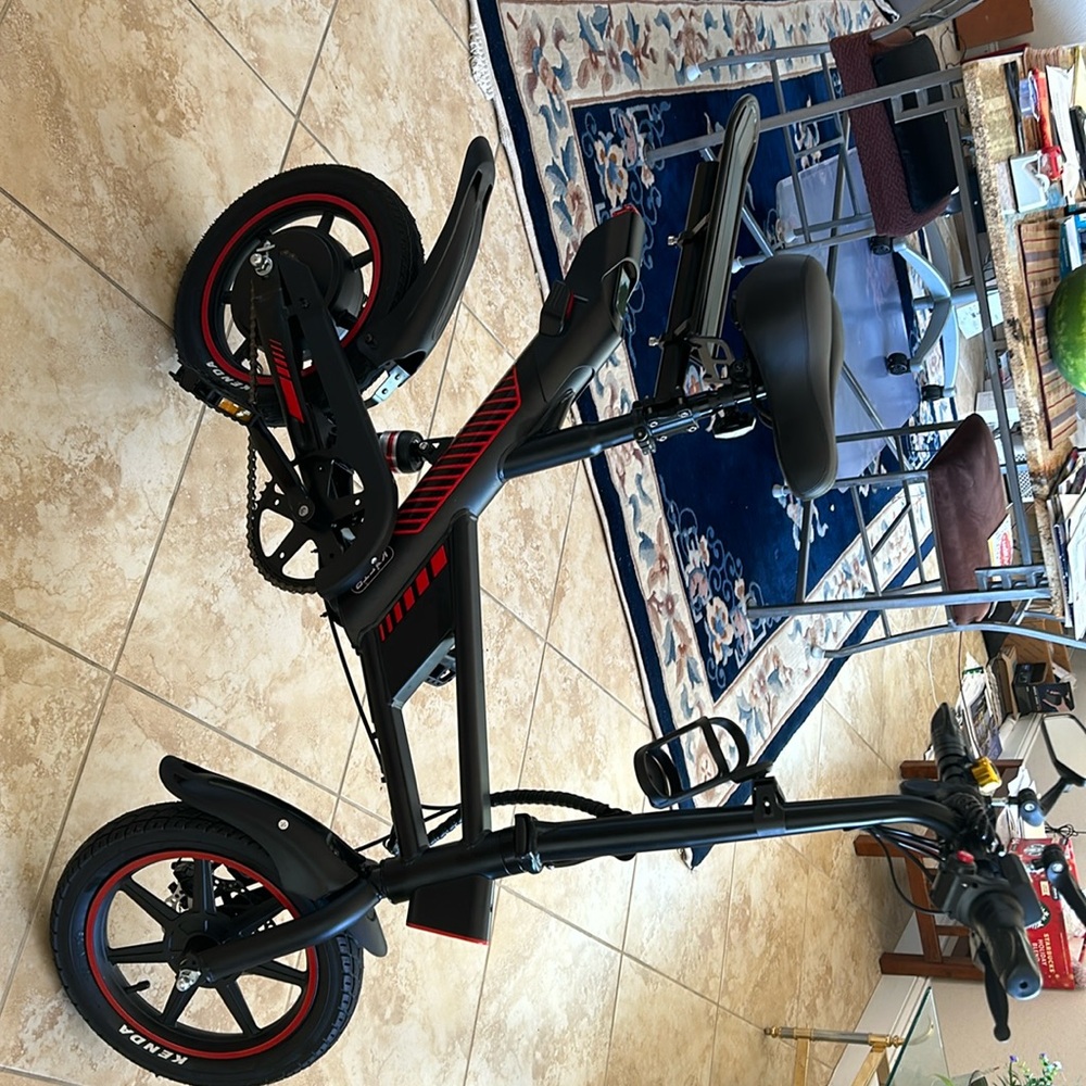 Brad new electric bike with one extra battery.